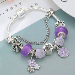 Girls Purple Charm Bracelet With Flower Design